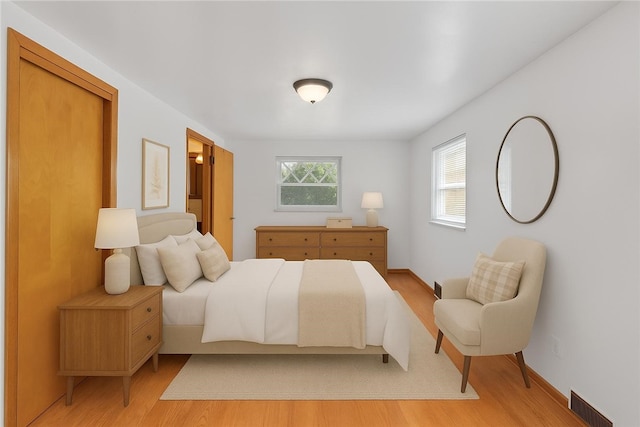 427 Cedar St, Jeannette, PA 15644 - bedroom featuring light wood finished floors and baseboards