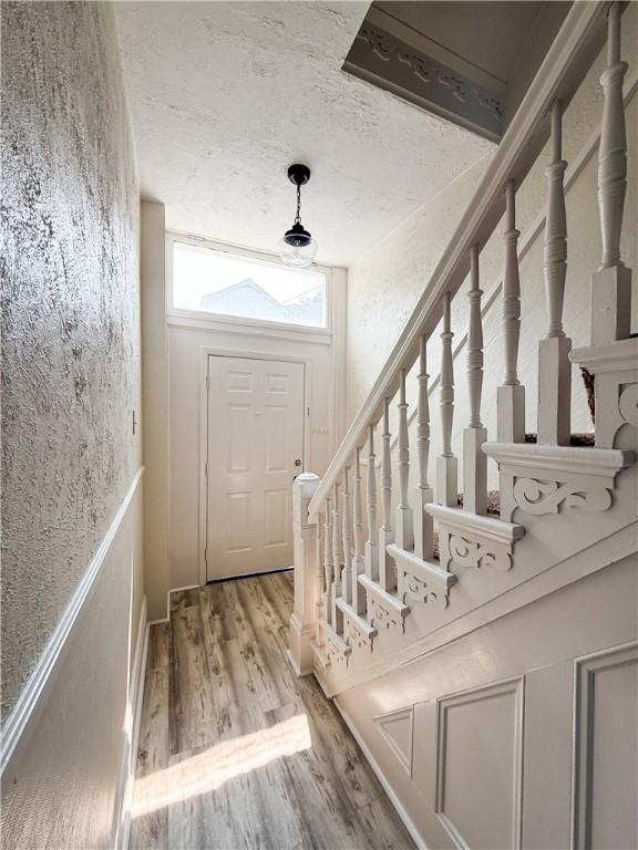 610 Southern Ave, Mt Washington, PA 15211 - foyer entrance featuring wood finished floors and stairway