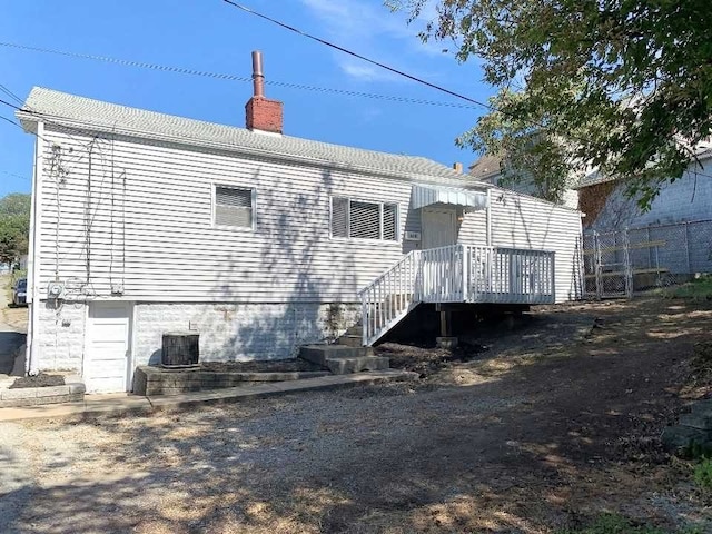 610 Southern Ave, Mt Washington, PA 15211 - back of property featuring a chimney, cooling unit, and a deck