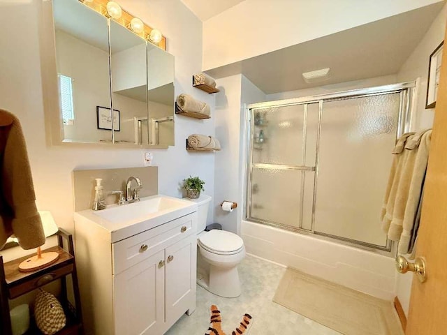610 Southern Ave, Mt Washington, PA 15211 - bathroom featuring toilet, vanity, and bath / shower combo with glass door