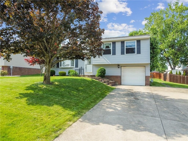 211 Old Meadow Dr, Hempfield Twp Wml, PA 15601 - view of front of house with driveway, a garage, and brick siding