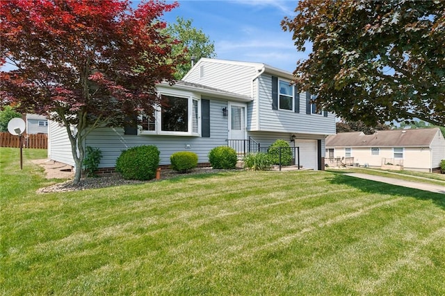211 Old Meadow Dr, Hempfield Twp Wml, PA 15601 - tri-level home featuring an attached garage and driveway