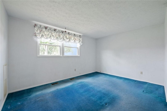 211 Old Meadow Dr, Hempfield Twp Wml, PA 15601 - empty room featuring carpet floors, a textured ceiling, and baseboards