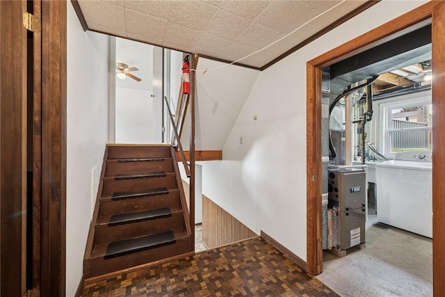 211 Old Meadow Dr, Hempfield Twp Wml, PA 15601 - staircase with washer / clothes dryer, baseboards, and ceiling fan