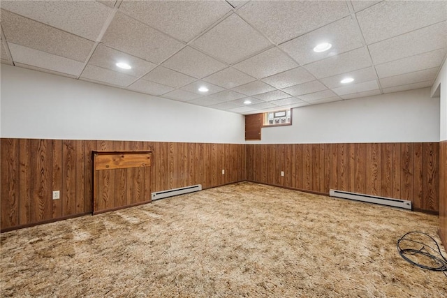 211 Old Meadow Dr, Hempfield Twp Wml, PA 15601 - carpeted spare room with a baseboard radiator, wainscoting, wood walls, a paneled ceiling, and recessed lighting