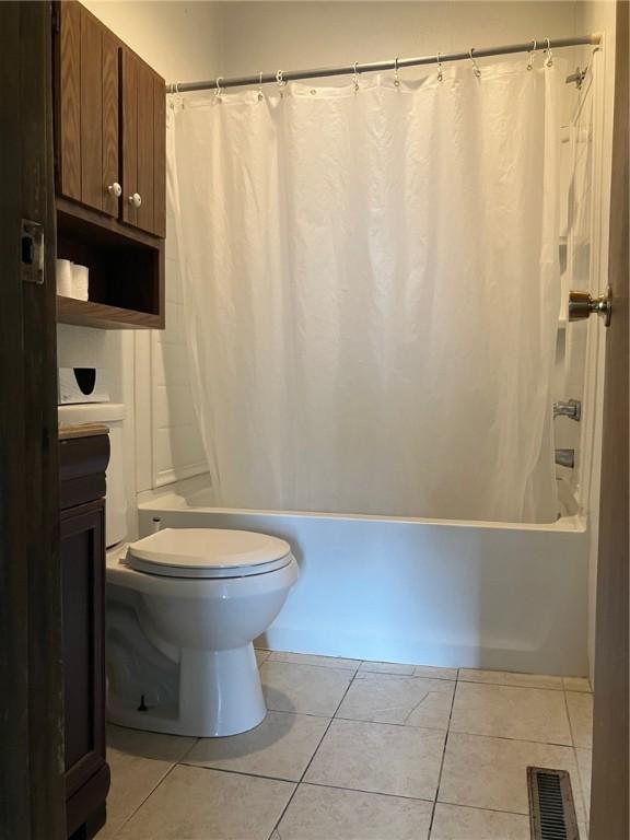 76 Laurel Rd, Fallowfield, PA 15022 - full bath with toilet, shower / bath combo with shower curtain, tile patterned floors, and vanity