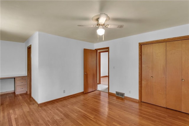 17 Lakeview Dr, Lackawannock Twp, PA 16159 - unfurnished bedroom featuring light wood finished floors, a closet, baseboards, and a ceiling fan