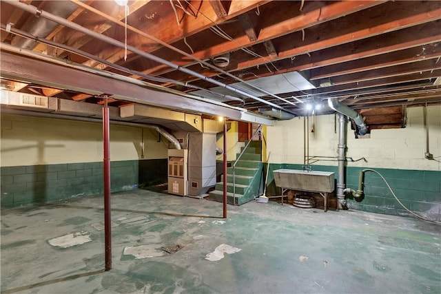17 Lakeview Dr, Lackawannock Twp, PA 16159 - unfinished below grade area featuring a sink, stairs, and heating unit