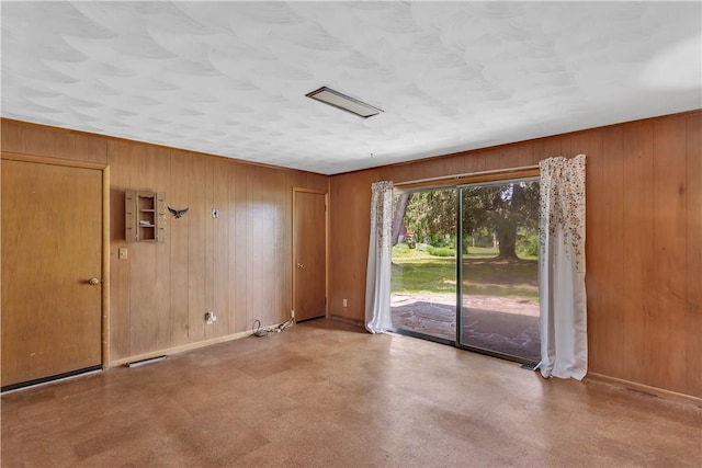 17 Lakeview Dr, Lackawannock Twp, PA 16159 - spare room with wood walls, baseboards, and tile patterned floors