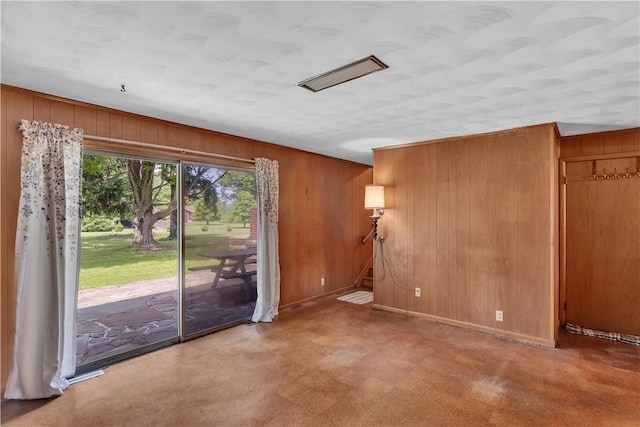 17 Lakeview Dr, Lackawannock Twp, PA 16159 - unfurnished room with wood walls, baseboards, and stairway