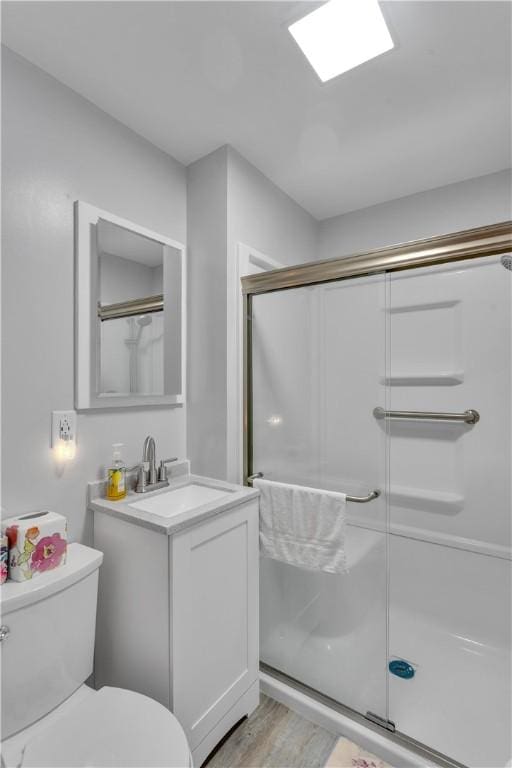 17 Lakeview Dr, Lackawannock Twp, PA 16159 - full bath featuring toilet, vanity, a shower stall, and wood finished floors