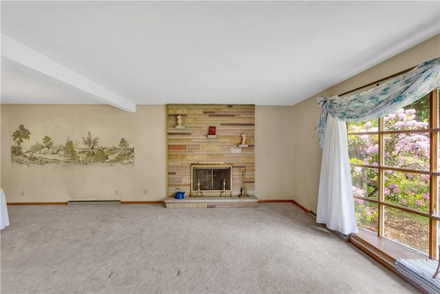 17 Lakeview Dr, Lackawannock Twp, PA 16159 - unfurnished living room featuring healthy amount of natural light, baseboards, carpet flooring, a stone fireplace, and beam ceiling