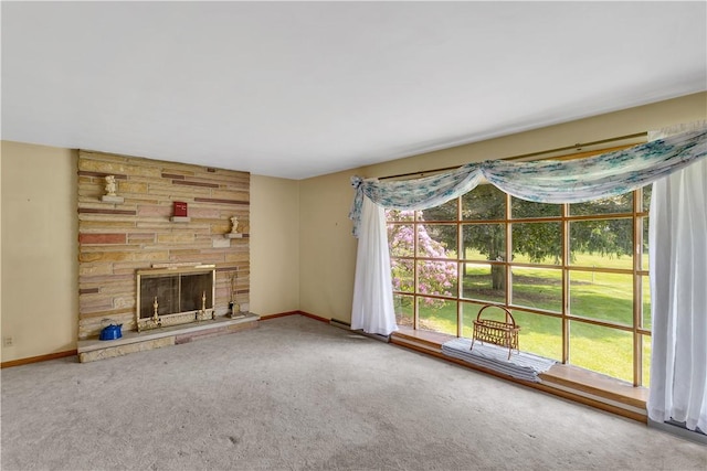 17 Lakeview Dr, Lackawannock Twp, PA 16159 - unfurnished living room with carpet, baseboards, and a fireplace