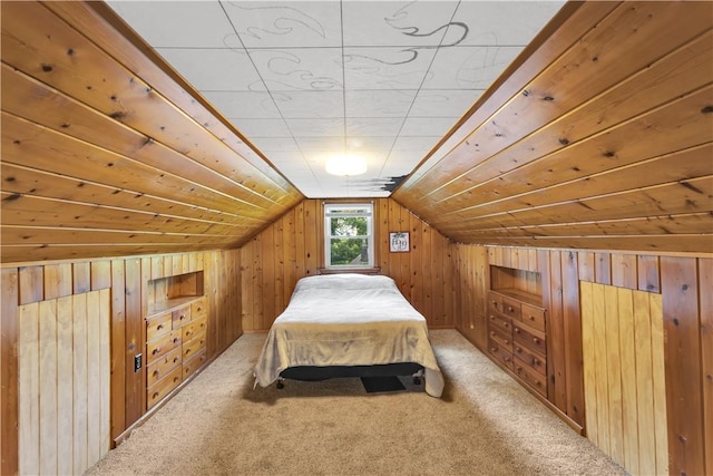 341 State Route 356, Washington Twp Wml, PA 15613 - bedroom with wooden walls, carpet floors, and vaulted ceiling