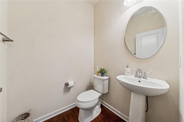 4054 Bentwood Dr, North Strabane, PA 15317 - half bathroom with wood finished floors, toilet, and baseboards