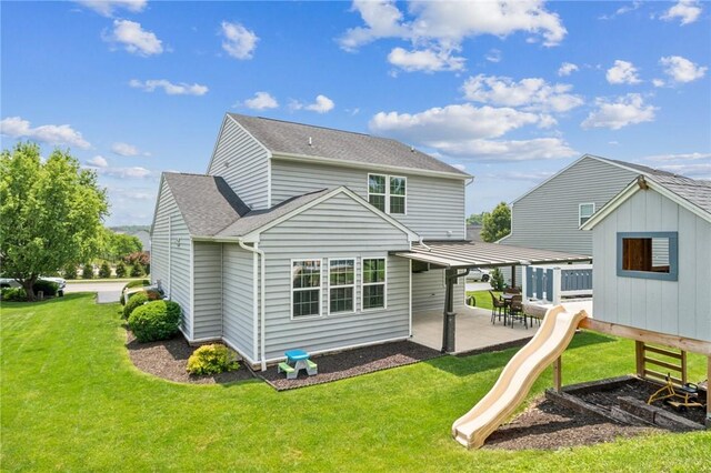 4054 Bentwood Dr, North Strabane, PA 15317 - rear view of house with a patio area, a yard, a shingled roof, and a playground