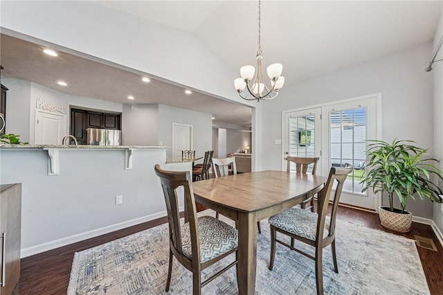 4054 Bentwood Dr, North Strabane, PA 15317 - dining room with dark wood-type flooring, baseboards, a chandelier, recessed lighting, and lofted ceiling