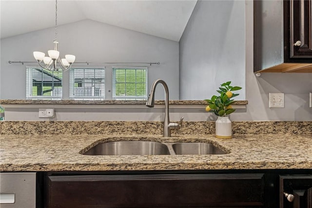 4054 Bentwood Dr, North Strabane, PA 15317 - kitchen view of a sink, a chandelier, light stone countertops, and decorative light fixtures
