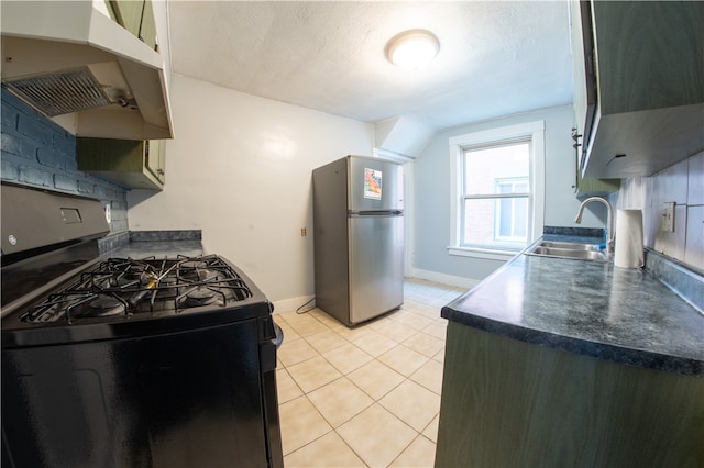 222-224 Alice St, Mount Oliver, PA 15210 - kitchen featuring freestanding refrigerator, black range with gas cooktop, a sink, under cabinet range hood, and light tile patterned floors