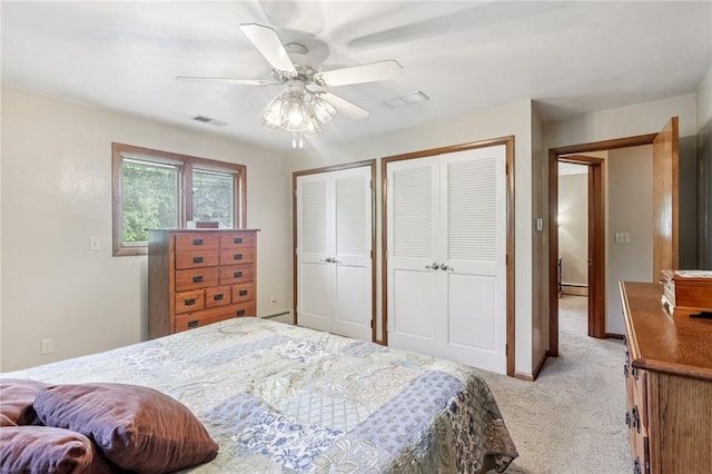 190 Pineview Dr, Pine Twp Nal, PA 15090 - bedroom with light colored carpet, multiple closets, a baseboard radiator, and ceiling fan