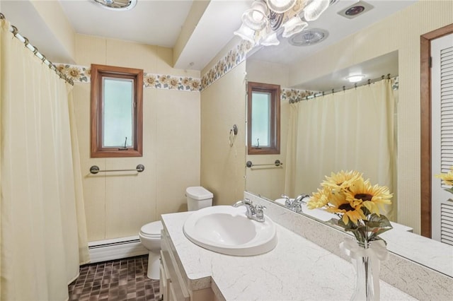 190 Pineview Dr, Pine Twp Nal, PA 15090 - full bath featuring a baseboard heating unit, toilet, healthy amount of natural light, and vanity