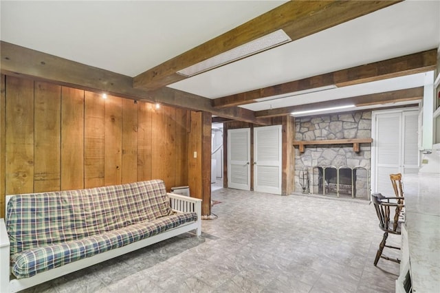 190 Pineview Dr, Pine Twp Nal, PA 15090 - living room featuring wooden walls, beamed ceiling, and a stone fireplace