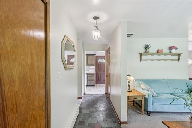 190 Pineview Dr, Pine Twp Nal, PA 15090 - hallway with baseboards and dark stone finish floors