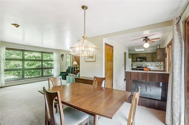 190 Pineview Dr, Pine Twp Nal, PA 15090 - dining space with light carpet, a chandelier, and ceiling fan