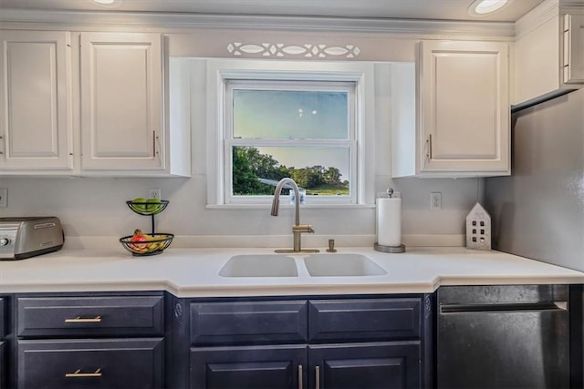 126 Scholl Ln, Rostraver, PA 15012 - kitchen featuring dishwashing machine, a sink, white cabinetry, and light countertops