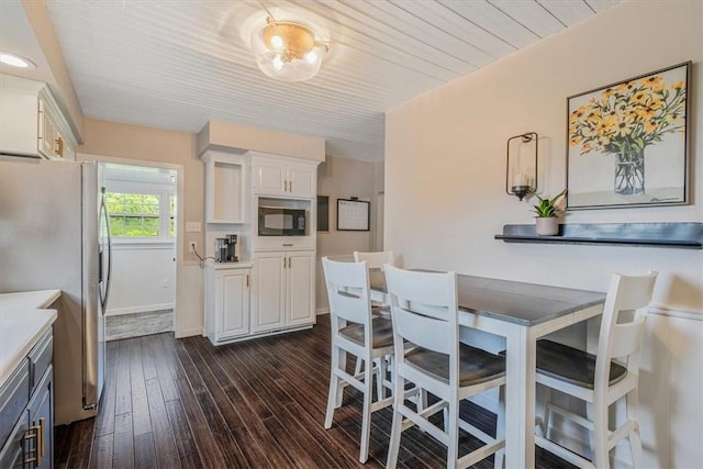 126 Scholl Ln, Rostraver, PA 15012 - dining area featuring dark wood-type flooring