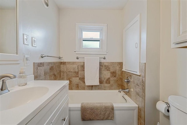 126 Scholl Ln, Rostraver, PA 15012 - full bathroom featuring toilet, a garden tub, and vanity
