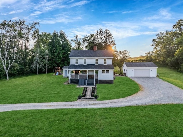 126 Scholl Ln, Rostraver, PA 15012 - view of front of house with an outbuilding, a detached garage, a chimney, a porch, and a front lawn
