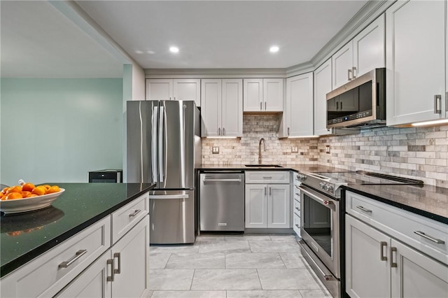 611 N Calais Dr Unit 4212, Mccandless, PA 15237 - kitchen featuring stainless steel appliances, a sink, backsplash, dark stone counters, and recessed lighting