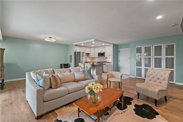 611 N Calais Dr Unit 4212, Mccandless, PA 15237 - living area with recessed lighting, light wood finished floors, and baseboards