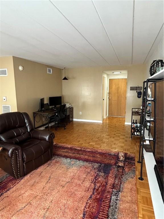 1326 6th Ave Unit 401, Beaver Falls, PA 15010 - living room with an office area and baseboards