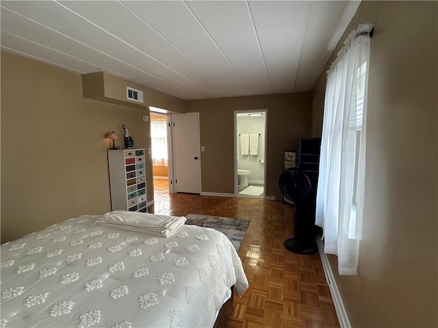 1326 6th Ave Unit 401, Beaver Falls, PA 15010 - bedroom with baseboards and ensuite bathroom