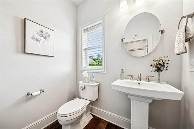137 Summer Ln, Mount Pleasant Twp Was, PA 15057 - bathroom featuring baseboards, toilet, wood finished floors, and a sink