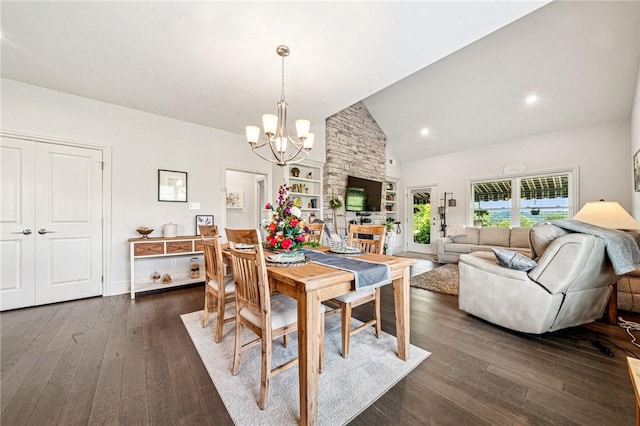 137 Summer Ln, Mount Pleasant Twp Was, PA 15057 - dining area with a chandelier, dark wood-style flooring, and high vaulted ceiling