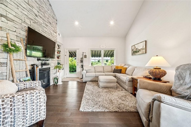 137 Summer Ln, Mount Pleasant Twp Was, PA 15057 - living room with dark wood-style floors, vaulted ceiling, a stone fireplace, and recessed lighting
