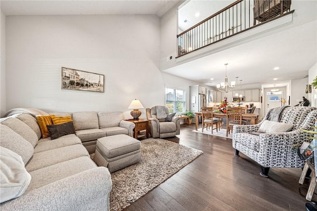 137 Summer Ln, Mount Pleasant Twp Was, PA 15057 - living room featuring a chandelier, dark wood-type flooring, a high ceiling, and recessed lighting