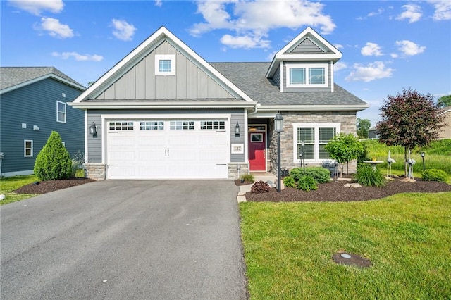 137 Summer Ln, Mount Pleasant Twp Was, PA 15057 - craftsman-style house featuring stone siding, board and batten siding, asphalt driveway, and a front yard