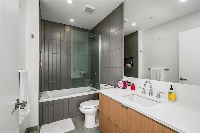 2554 Smallman St Unit 406, Downtown Pgh, PA 15222 - bathroom featuring tile patterned floors, toilet, tiled shower / bath combo, vanity, and recessed lighting