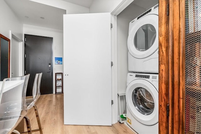 2554 Smallman St Unit 406, Downtown Pgh, PA 15222 - laundry area with stacked washer and clothes dryer and light wood-style flooring