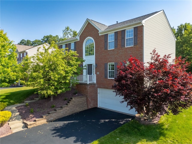 5416 Forest Edge Dr, South Fayette, PA 15057 - colonial inspired home with brick siding, driveway, and a garage