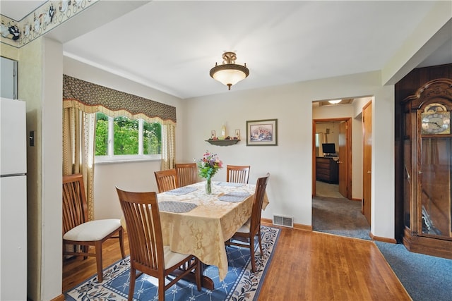131 Howley Ave, Chippewa Twp, PA 15010 - dining area with baseboards and wood finished floors