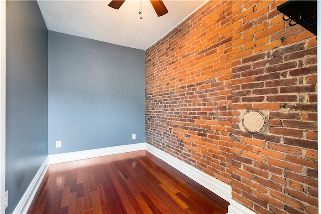 1812 Carey Way S, Side, PA 15203 - empty room featuring a ceiling fan, baseboards, dark wood-style flooring, and brick wall