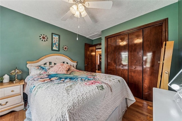 922 Old Ridge Rd, Cross Creek Twp, PA 15340 - bedroom featuring wood finished floors, a closet, a textured ceiling, and ceiling fan