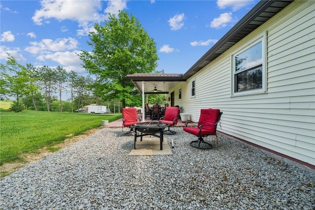 922 Old Ridge Rd, Cross Creek Twp, PA 15340 - view of patio featuring a ceiling fan and a fire pit