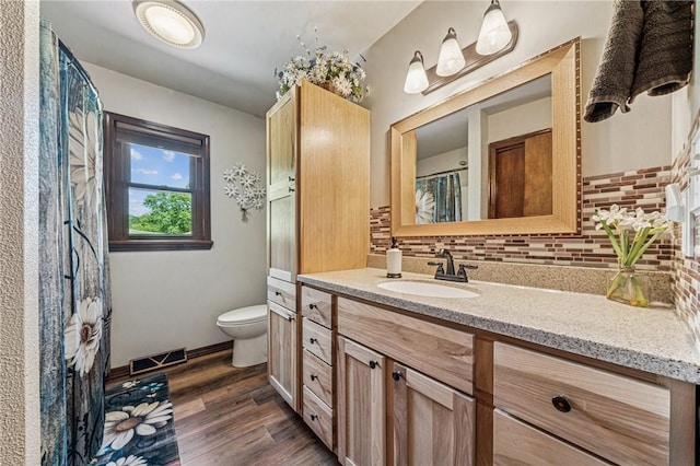 922 Old Ridge Rd, Cross Creek Twp, PA 15340 - bathroom featuring vanity, backsplash, and wood finished floors