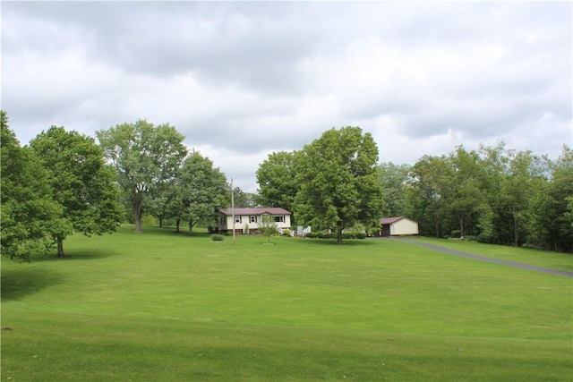 922 Old Ridge Rd, Cross Creek Twp, PA 15340 - view of green lawn with an outbuilding and a detached garage